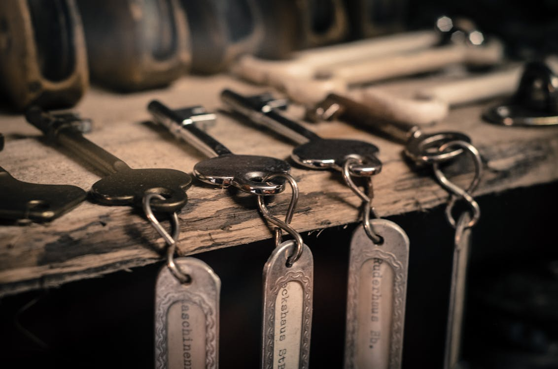 Close-up of multiple antique-style keys hanging together