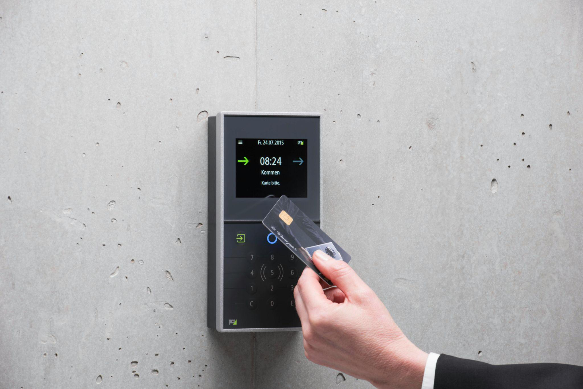 A person using a card for access