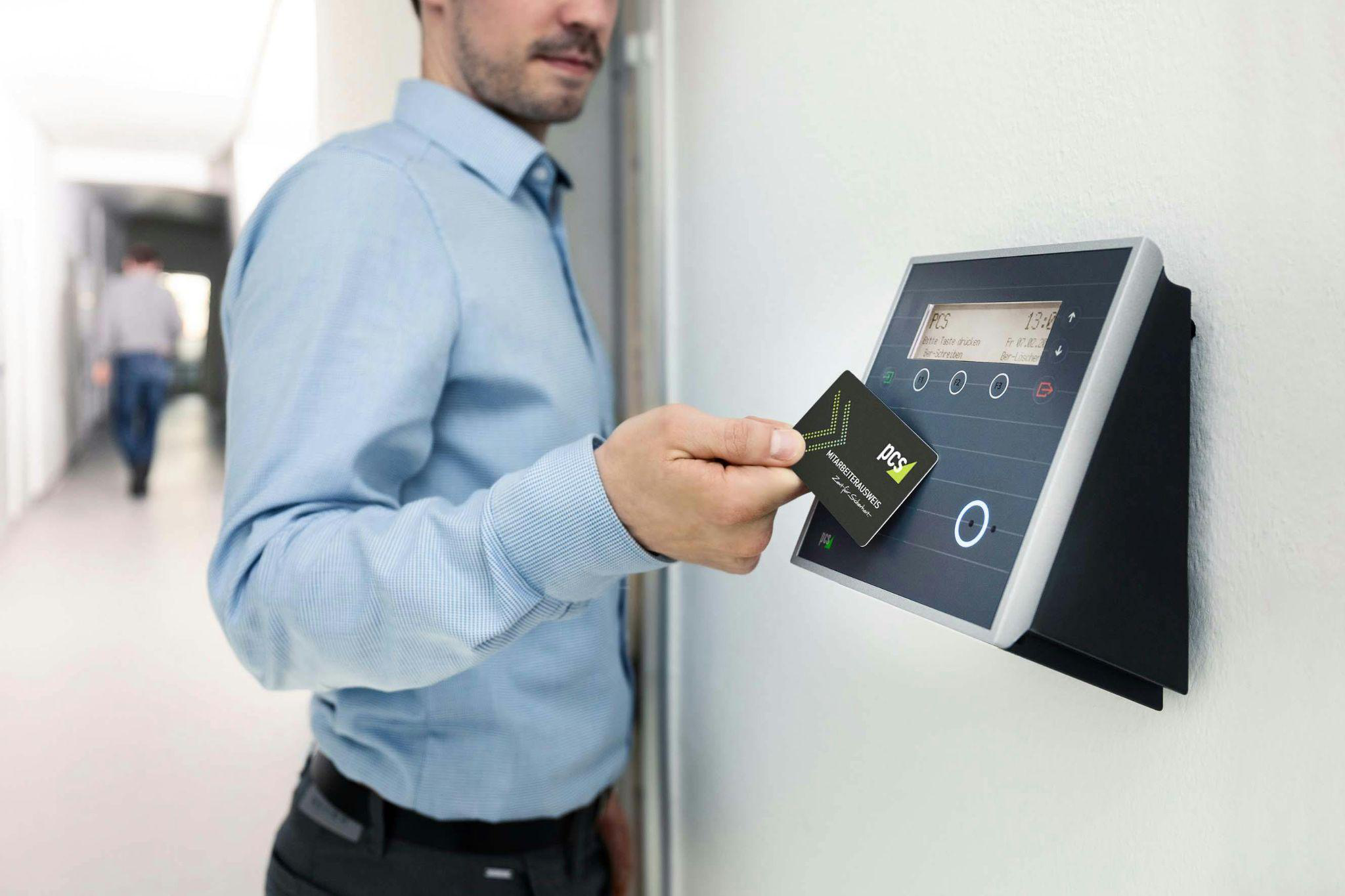 A person using a card for access